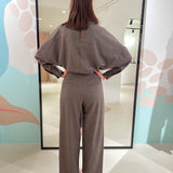 Blusa over collo alto Niu